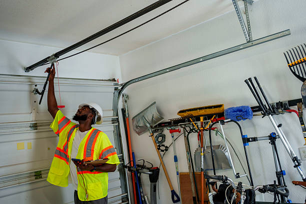 Professional Garage Door Panel Replacement technician working in Solon, IA